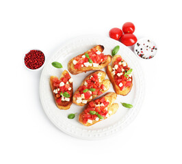 Tasty bruschettas with mozzarella cheese, tomatoes, basil and spices isolated on white, top view