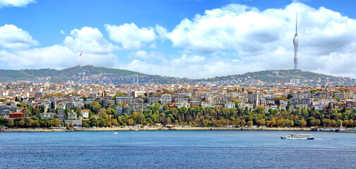 Panorama of Istanbul with Bosphorus Strait. The futuristic Kucuk Camlica TV Radio Tower stands tall on the eastern side of Istambul.