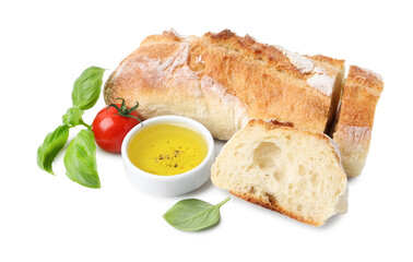 Tasty baguette, oil, tomato and basil isolated on white