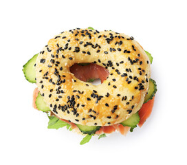Delicious bagel with salmon, cucumber and arugula isolated on white, top view