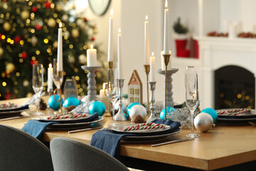 Festive table setting with Christmas decor at home