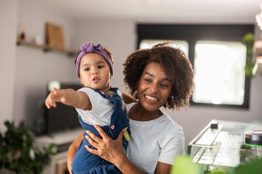 Mother and child sharing a joyful moment at home