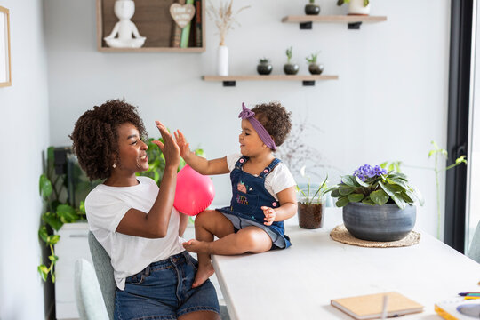 Mother and child sharing a joyful moment at home