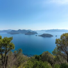 Fototapeta premium Sea view with islands and mountains and trees around.