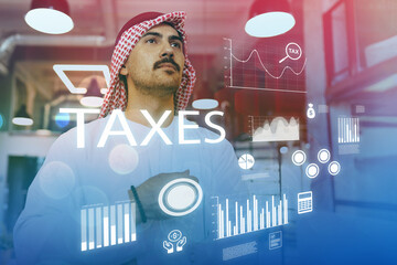 Professional analyzing tax data in a modern workspace during the day