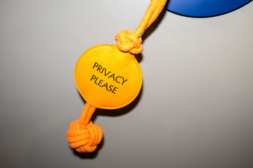 Privacy sign on door requesting not to disturb