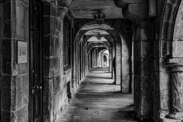 Fototapeta premium Historic Stone Arcade Corridor in Black and White