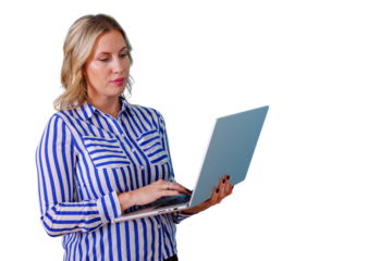 Blonde businesswoman standing, typing on laptop, using technology for remote work or online communication on transparent background