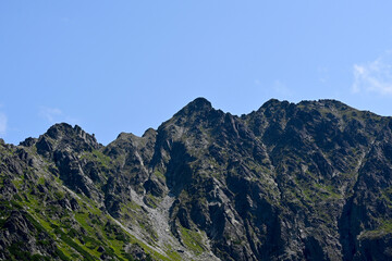 Obraz premium Tatra mountains in Poland. Granaty mountain ridge, part of Orla Perc. Skrajny Granat, Zadni Granat, Posredni Granat peaks. Tatra National Park