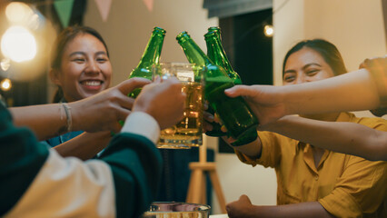 Group of multiethnic young adult Asia friend drinking alcohol beer bottle glass and having fun...