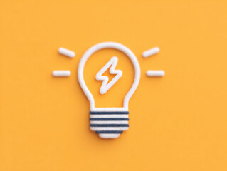 Light bulb symbol representing energy efficiency and innovation, set against vibrant orange