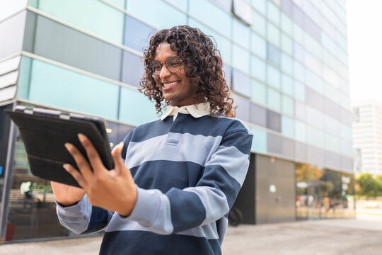 Non-binary person enjoying life in the city