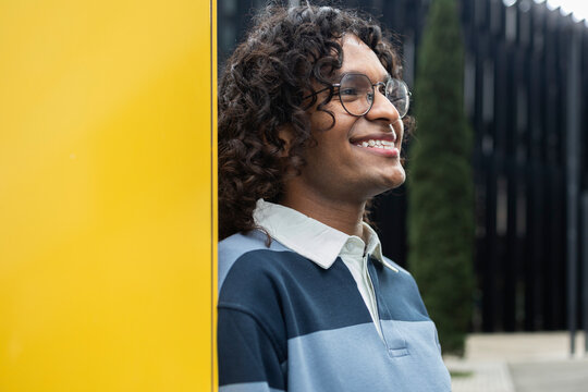 Confident non-binary person enjoying urban life