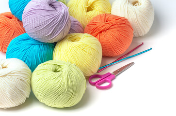Colorful yarn balls isolated on white