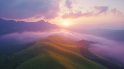 The sunset over the cloud-shrouded mountain peaks conveys the harmony of nature, serving as an atmospheric backdrop for meditative practices or tourist attractions.