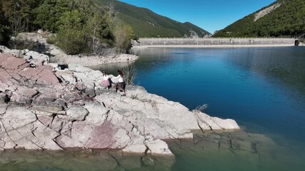 Mother and daughter exploring Italian lakeshore - Powered by Adobe