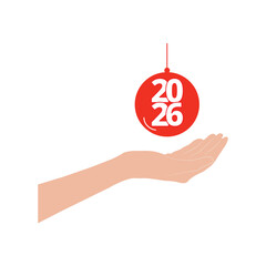 Hand holding a christmas ball ornament with 2026 number inside isolated on a white background