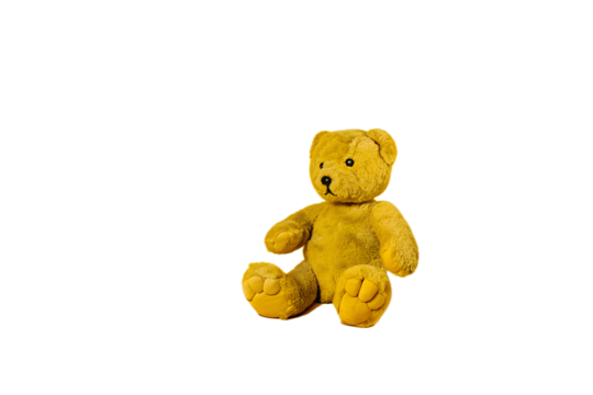 A charming and friendly yellow teddy bear, meticulously photographed with professional lighting, isolated on a pure white backdrop, symbolizing warmth, childhood, and companionship