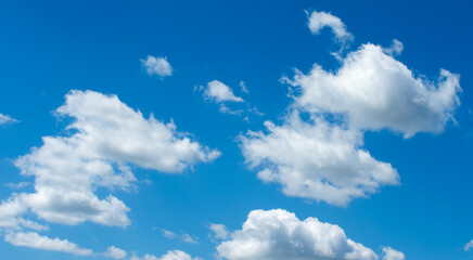 White clouds in blue sky.