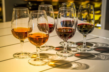 Fototapeta premium port wine testing, glasses with drink - white and red