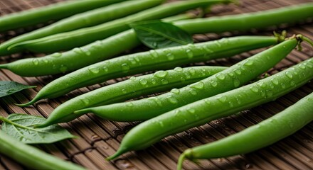 Fototapeta premium Fresh green beans arranged on a wooden surface closeup view