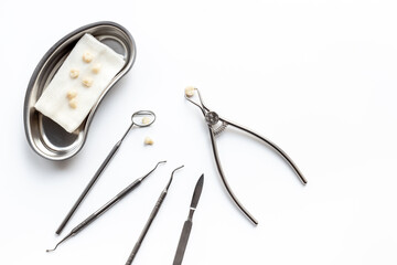 Dental equipment tools for teeth care on white background. Professional Dentist desktop, top view