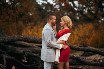 Loving couple embracing in an autumn park