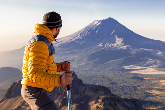 Climbing Iztaccihuatl with Popocatepetl in the distance