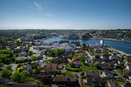 Modern buildings form Sandnes city skyline under clear Scandinavian skies.