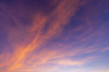Clouds and sky backdrop at sunset and sunrise,Sunset Sky Clouds in the evening with Red, Orange, Yellow and purple sunlight on Golden hour after sundown, Romantic sky in summer on Dusk Twilight 