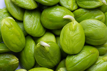 Green stink beans, a local food in southern Thailand,Macro stink bean seeds,Fresh peeled peat peas (nao beans), a traditional Indonesian tropical vegetable ready to cook.