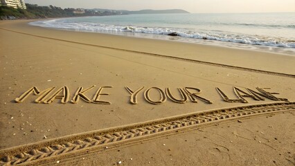 Text in sand says Make Your Lane on a beautiful beach