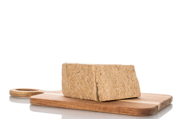 Fragrant sweet halva isolated on white background, macro.