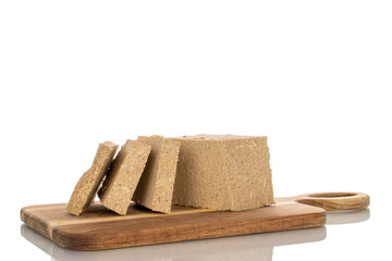 Fragrant sweet halva isolated on white background, macro.