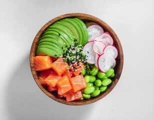 Fresh salmon poke bowl with avocado, edamame, radish, and sesame seeds arranged in a wooden bowl