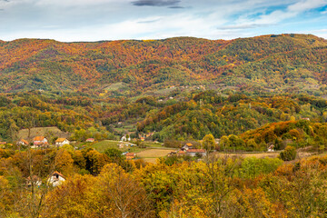 Low forested mountains on an autumn day