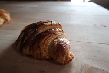 croissant on a wooden table