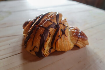 croissant on a wooden table