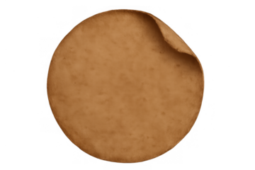 Round aged parchment sticker with rustic texture and curled corner offering blank retro label space, transparent background