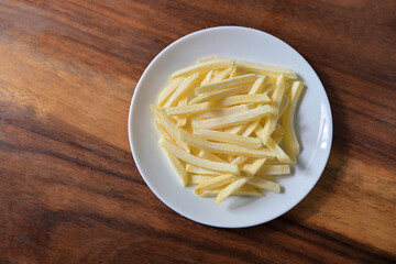 top view of raw potato to being French fries for eating