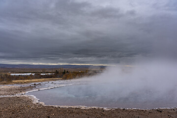 Exploring the Geysir Geothermal Area, where bubbling earth and erupting steam reveal Iceland’s untamed energy