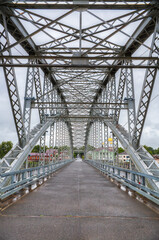 Fototapeta premium Metal arch bridge in the city of Borovichi, Russia.