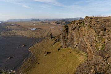 Perched above roaring waves and endless black sands, Dyrhólaey reveals Iceland’s raw beauty.