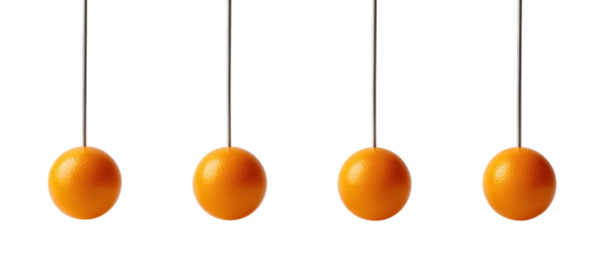 Close-up of a Newton's cradle, four spheres suspended on a dark background, isolated objects