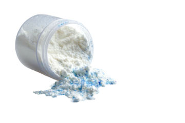 A clear plastic jar tilted, spilling white and blue powder against a black background