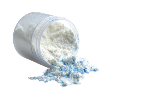 A clear plastic jar tilted, spilling white and blue powder against a black background