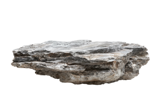 Close-up, level view of a jagged gray, layered rock formation against a void background