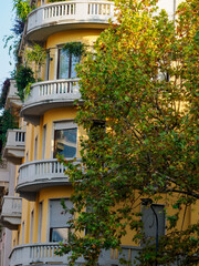 Historic residential buildings along via Abbondio Sangiorgio in Milan, Italy