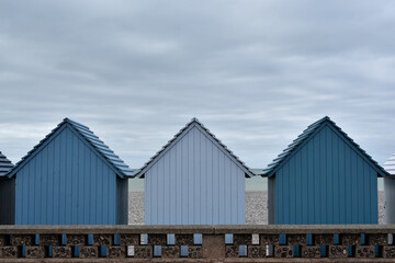 Fototapeta premium Beach huts in Dieppe France painted in different shades of blue