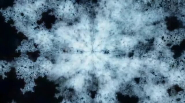 Abstract snowflake pattern in shades of blue on black background